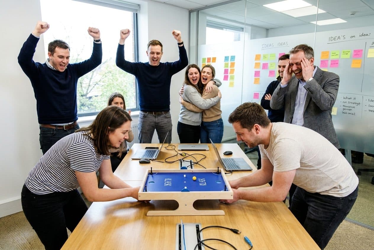 Friday at the office — The meeting-room table was made for this.